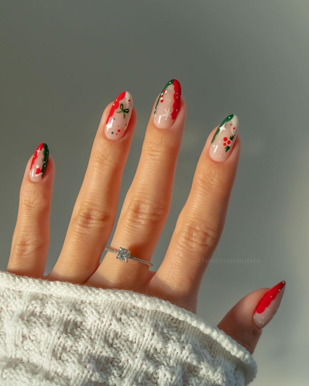 Christmas-inspired nails with playful red and green designs