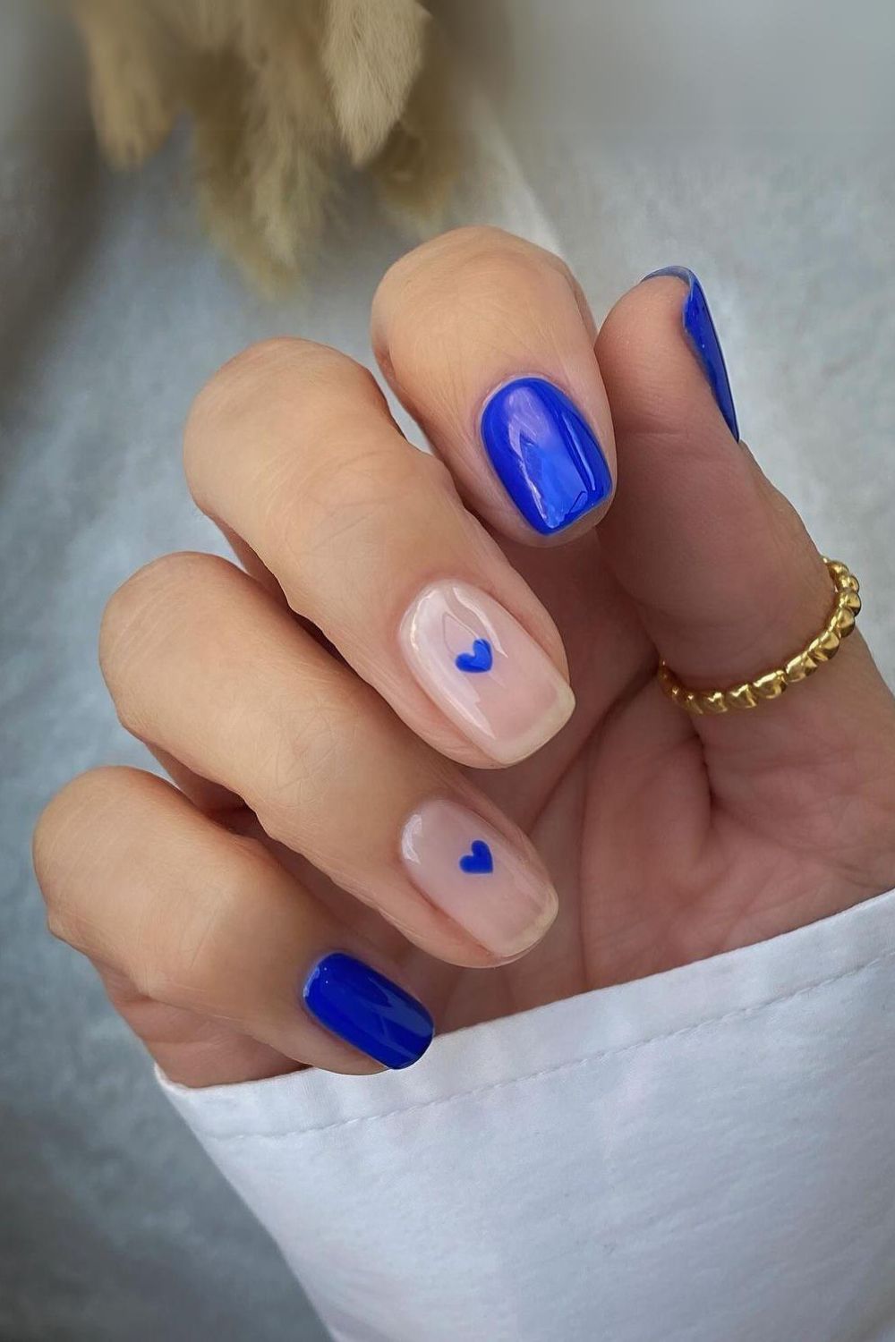 Cobalt blue nails with heart accents