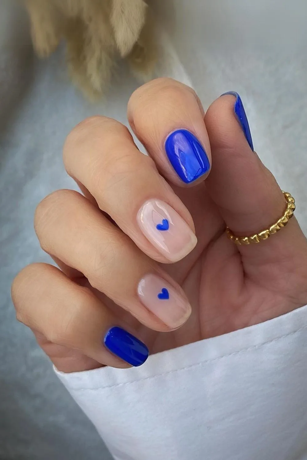 Cobalt blue nails with heart accents