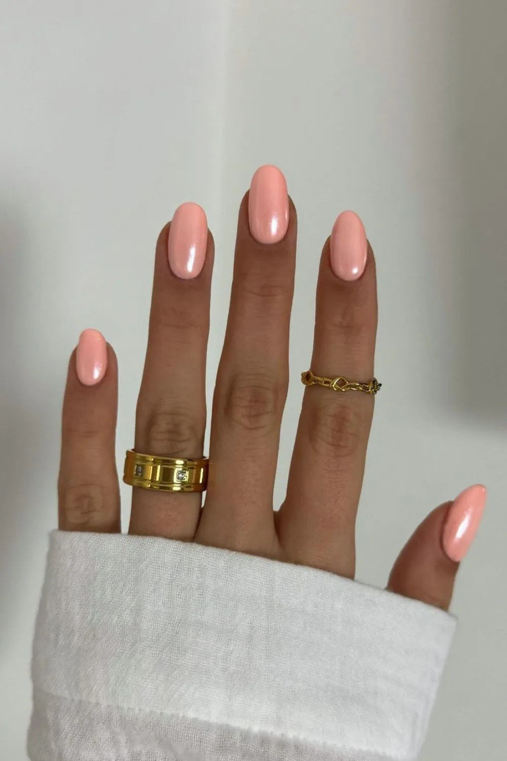 Coral peach chrome nails