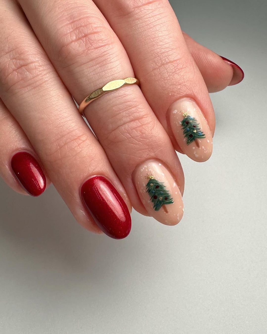 Dark red nails with Christmas tree details