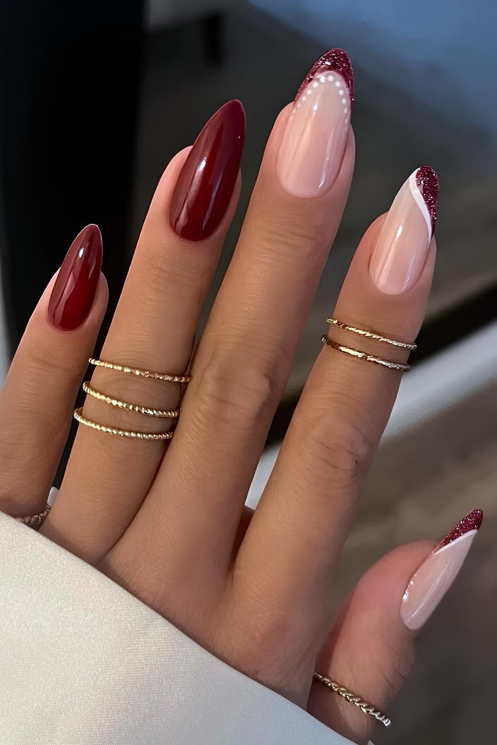 Dark red nails with glitter and white lines