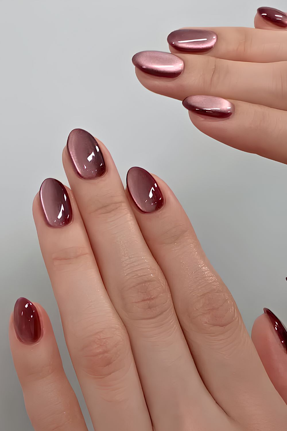 Deep plum cat eye nails