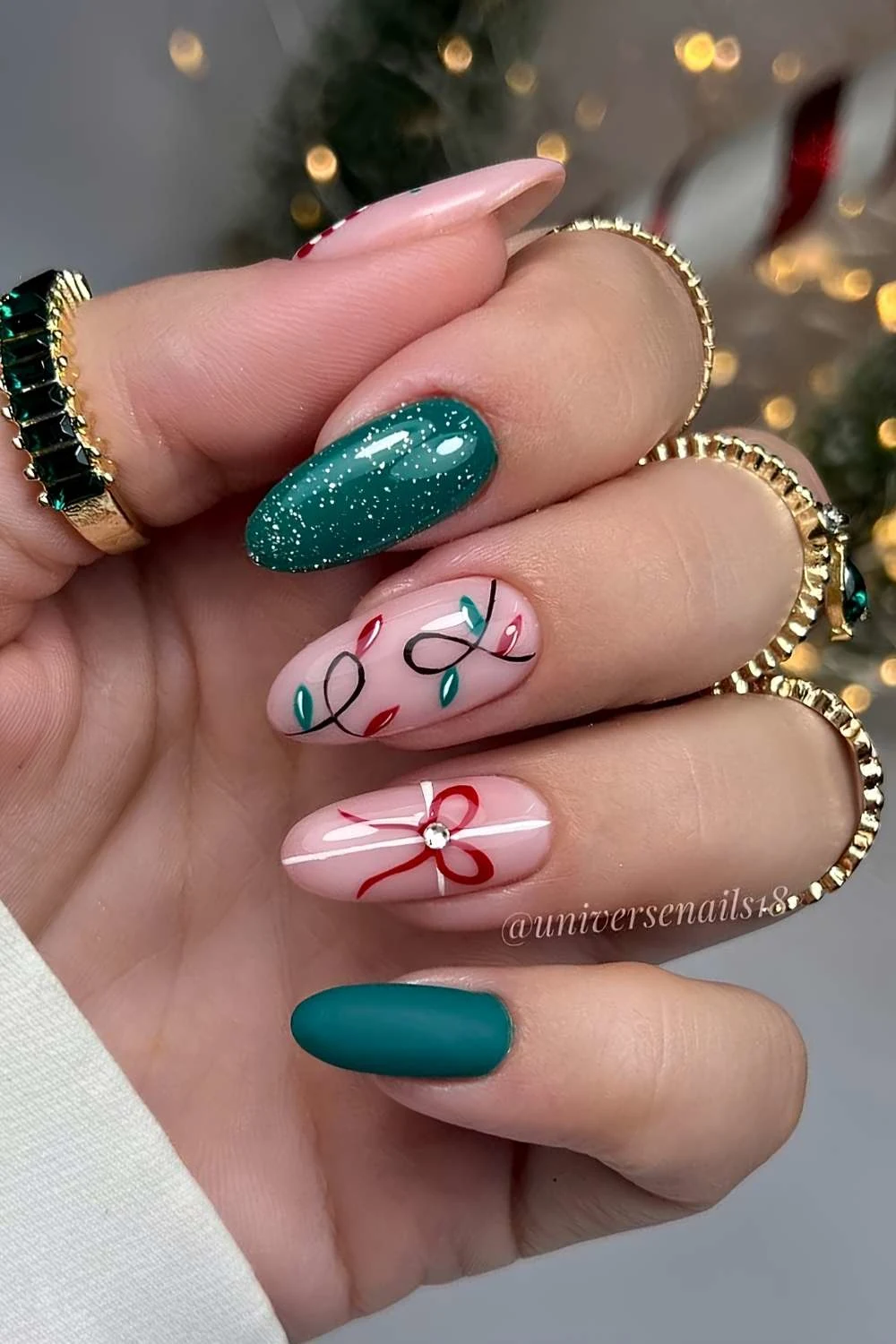 Green and red manicure with Christmas light art