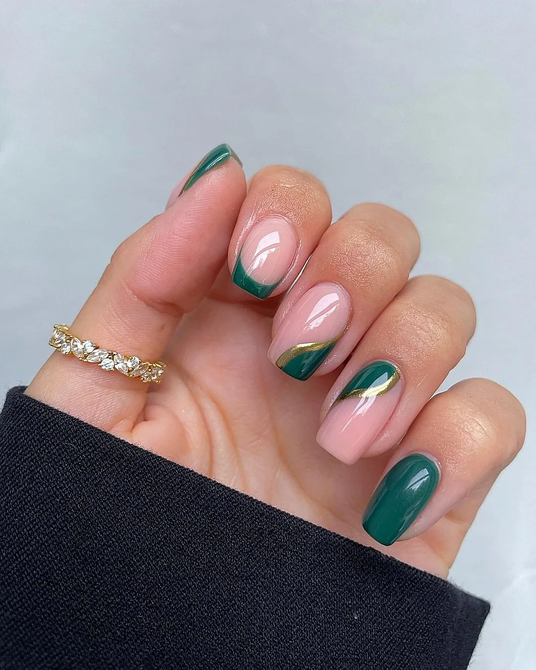 Green french tips with gold accents