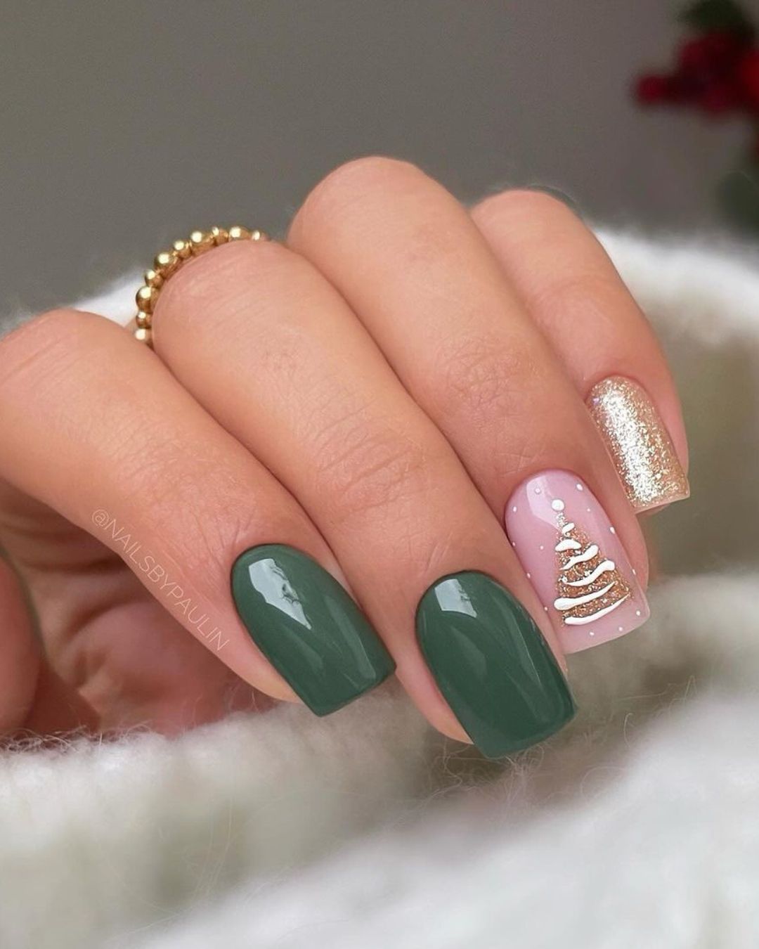 Green nails with gold Christmas tree accent