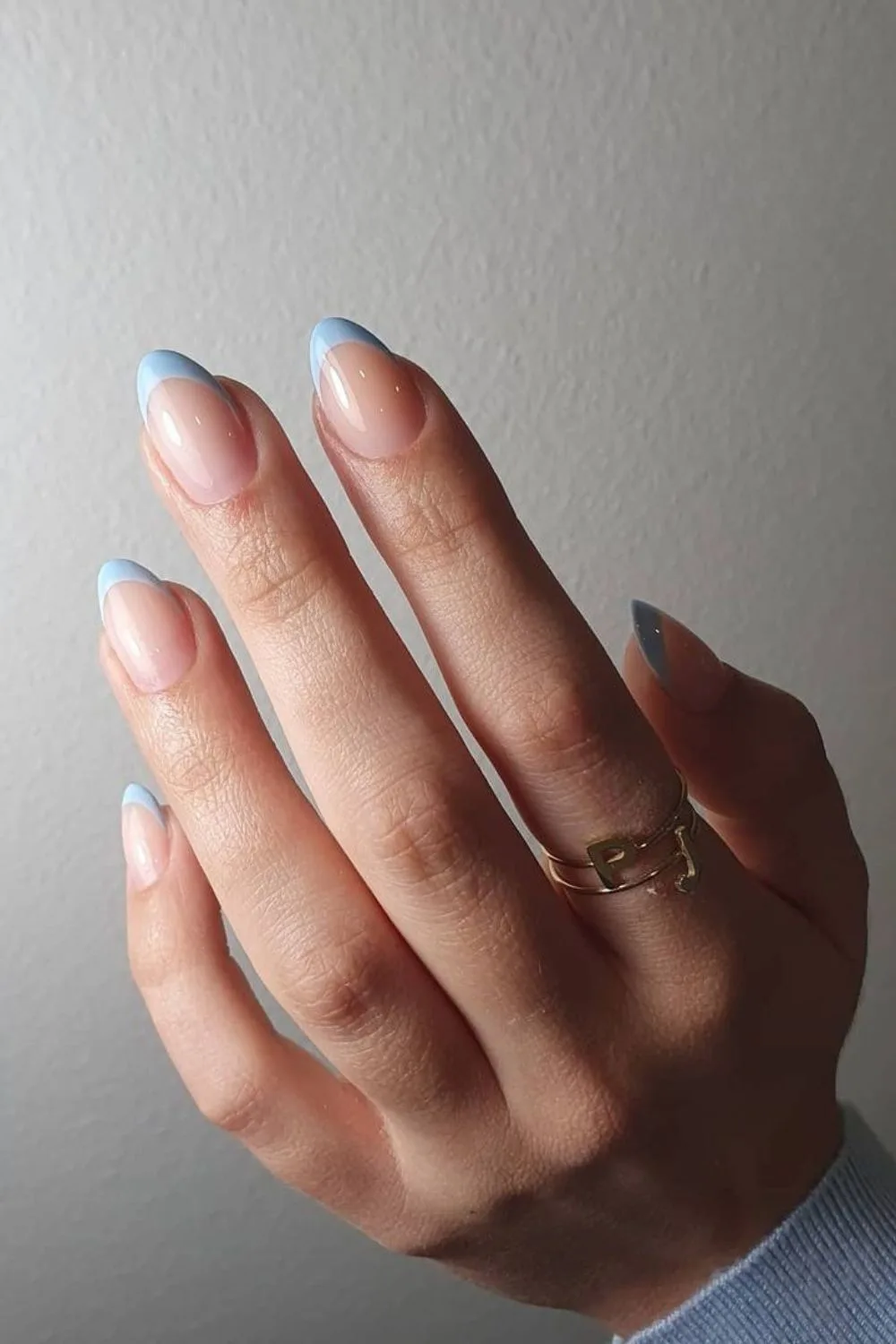 Light blue french tip mani