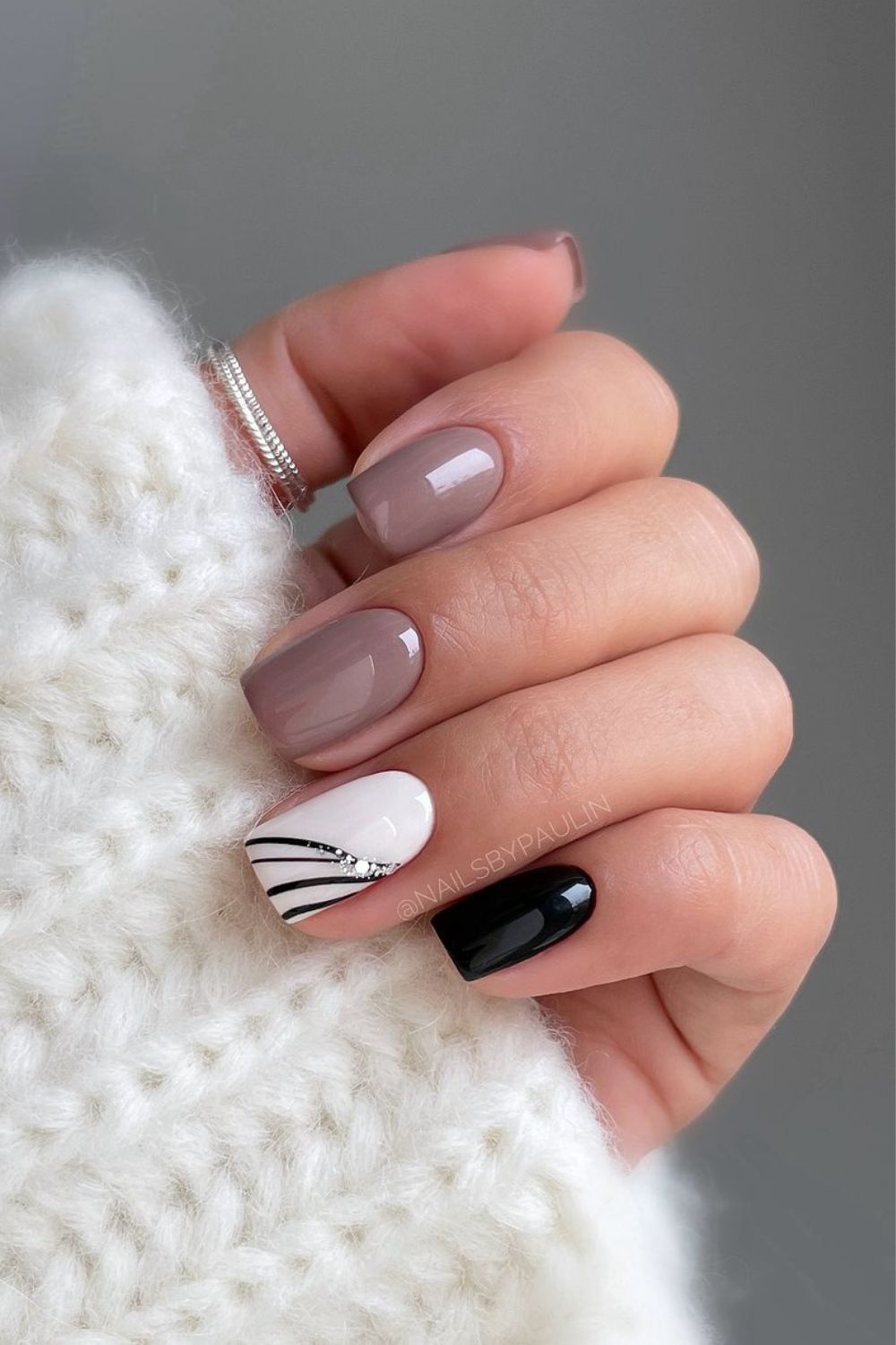 Mauve mani with black and white and stripe accents