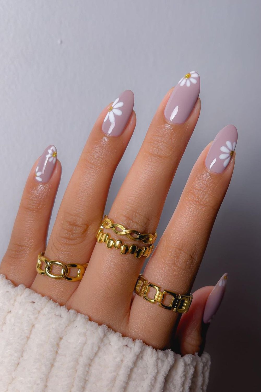 Mauve nails with daisy accents