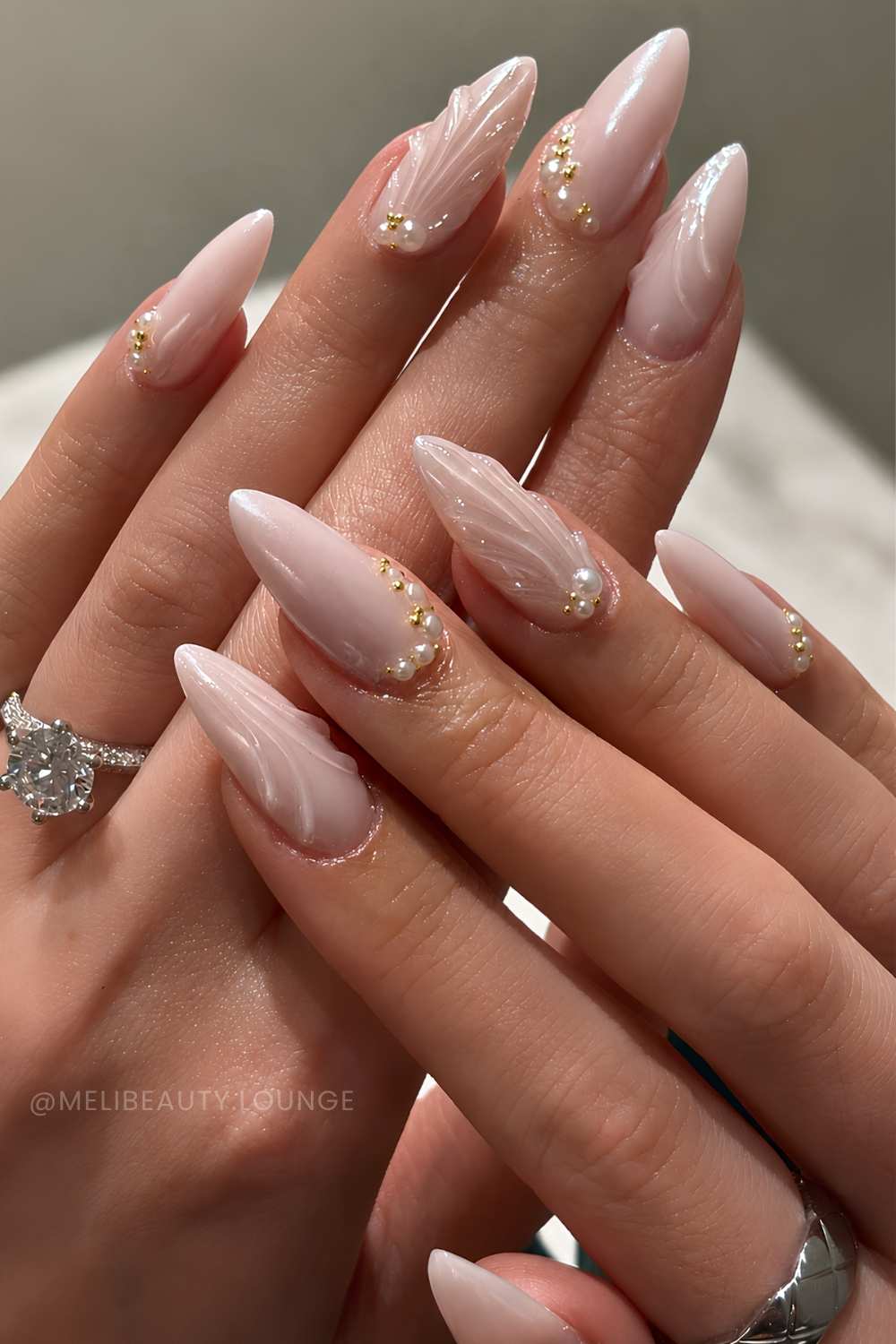 Milky white mani with pearls and seashell art