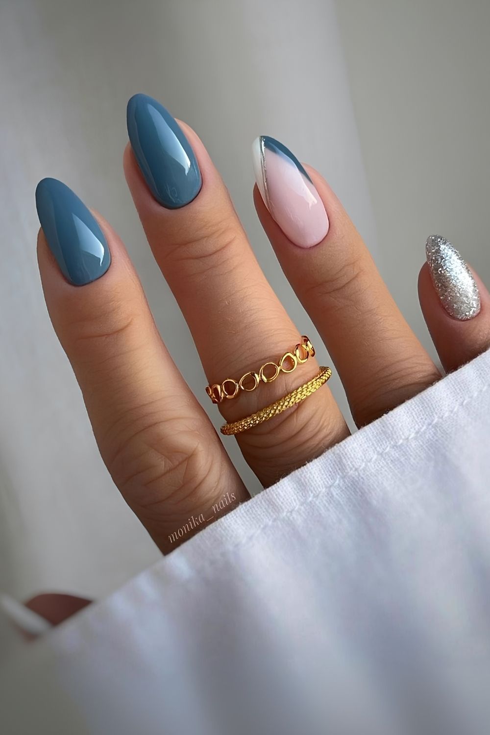Moonstone blue nails with accent glitter