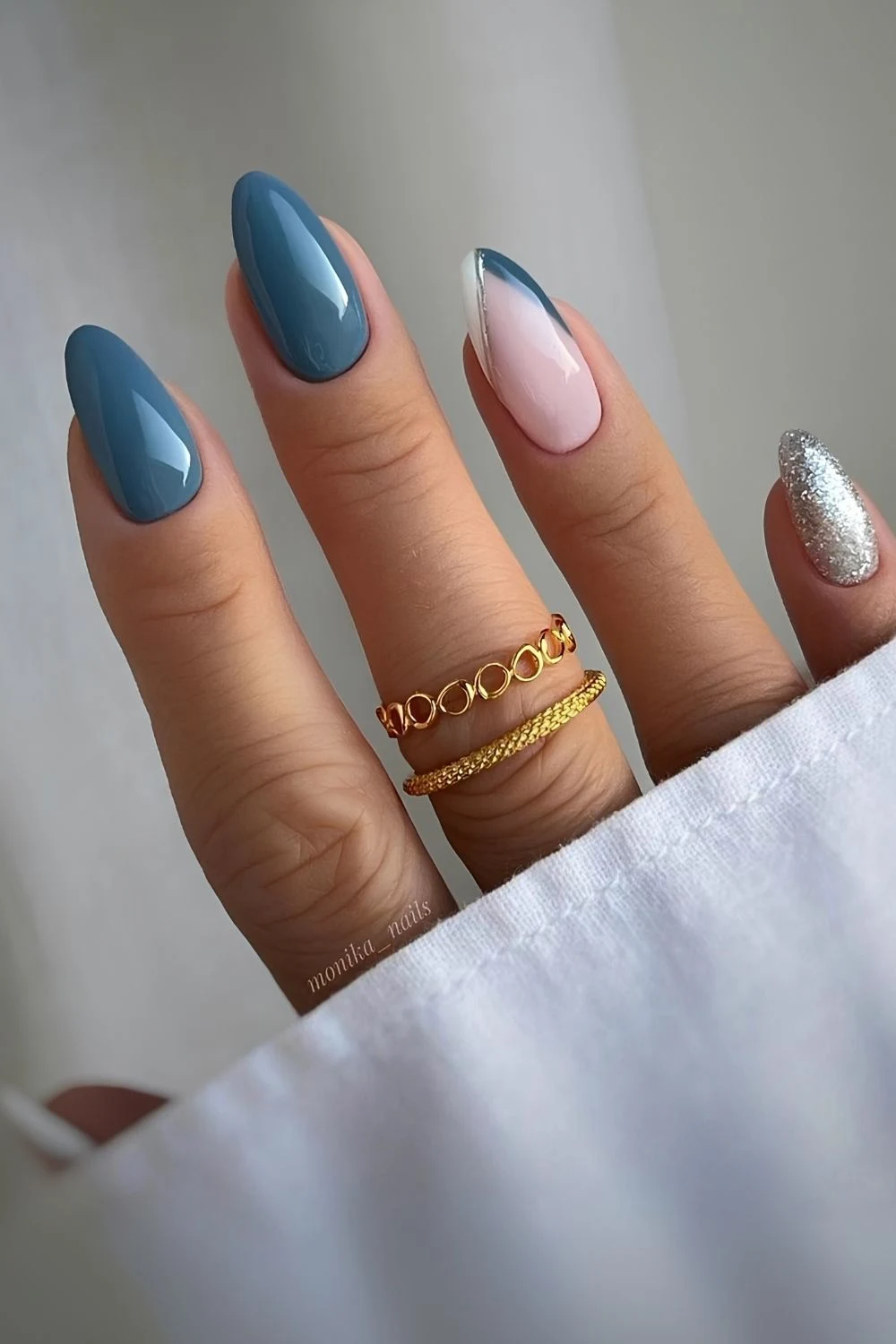 Moonstone blue nails with accent glitter