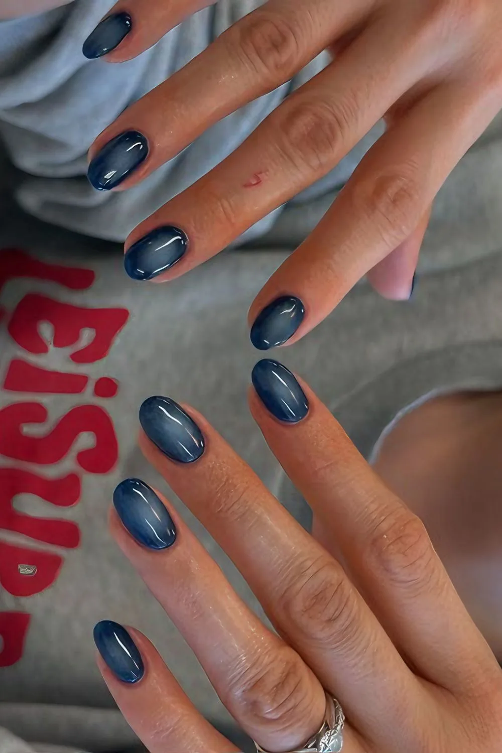 Navy blue aura-effect mani