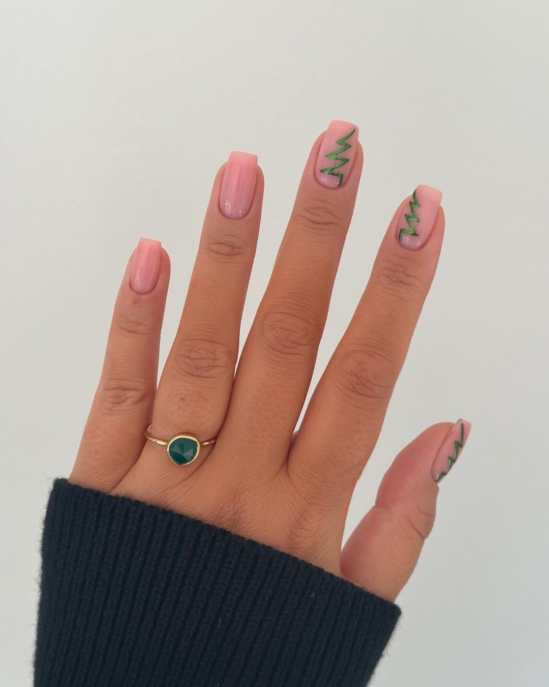 Nude nails with green chrome Christmas tree design