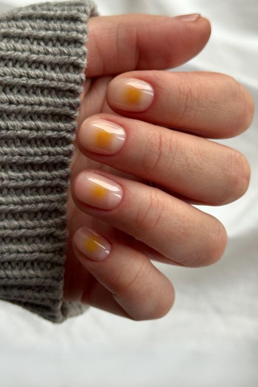 Orange blush-effect manicure