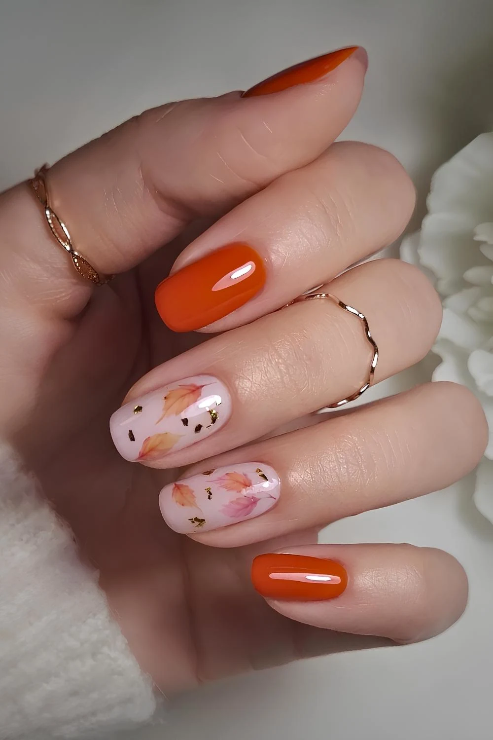 Orange mani with fall leaf art