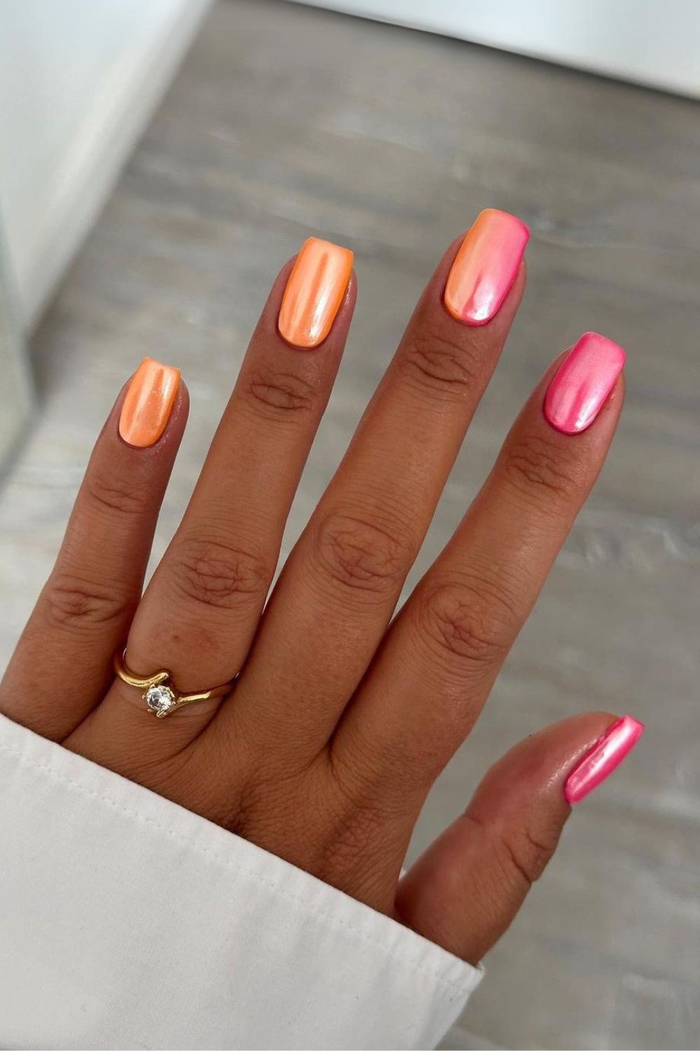 Peach and pink chrome-effect mani