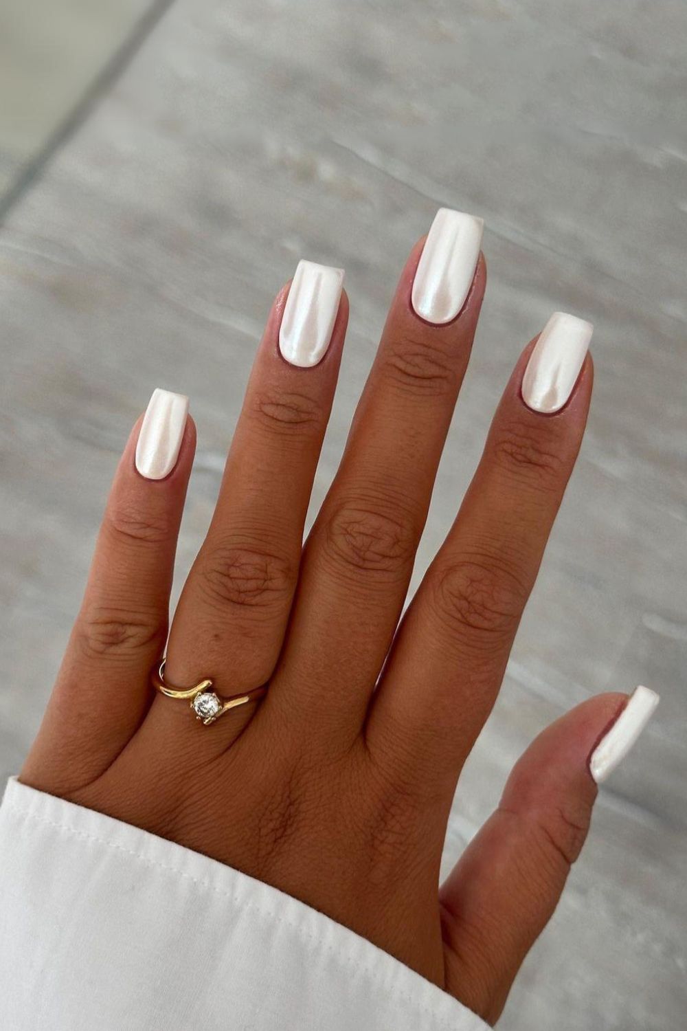 Pearlescent white chrome nails