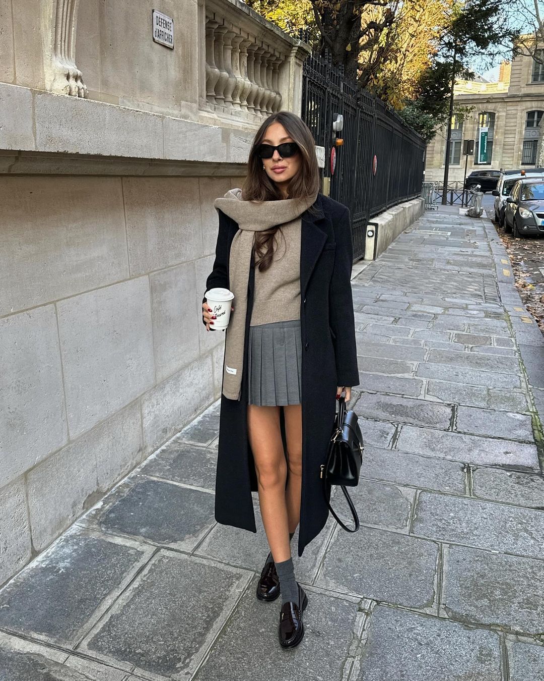 Pleated Mini Skirt and Black Coat