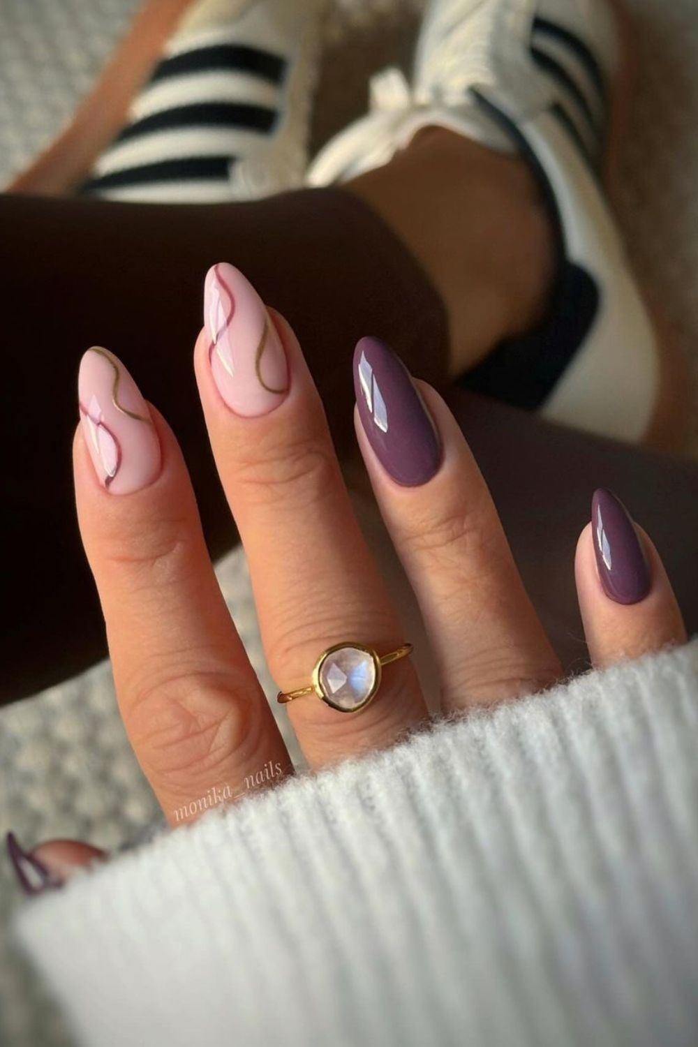 Plum mauve and nude nails with swirls