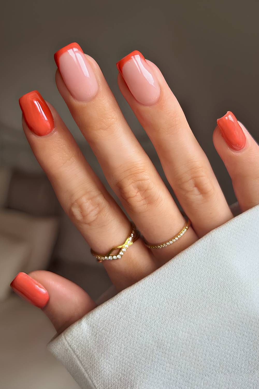Pumpkin orange nails with accent French tips
