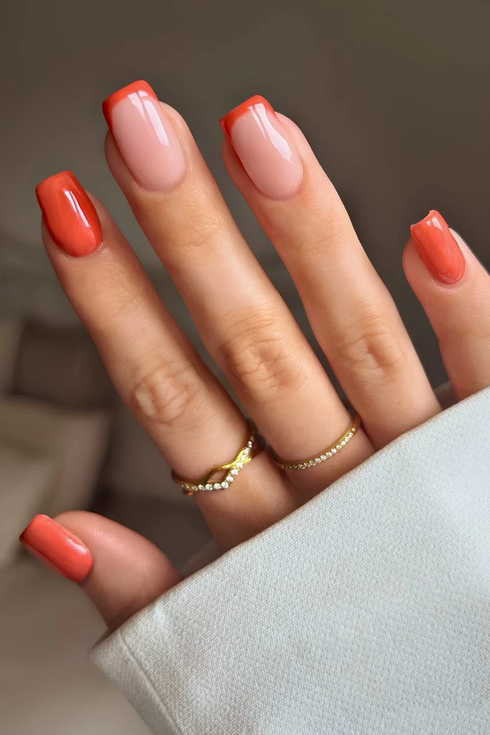 Pumpkin orange nails with accent French tips
