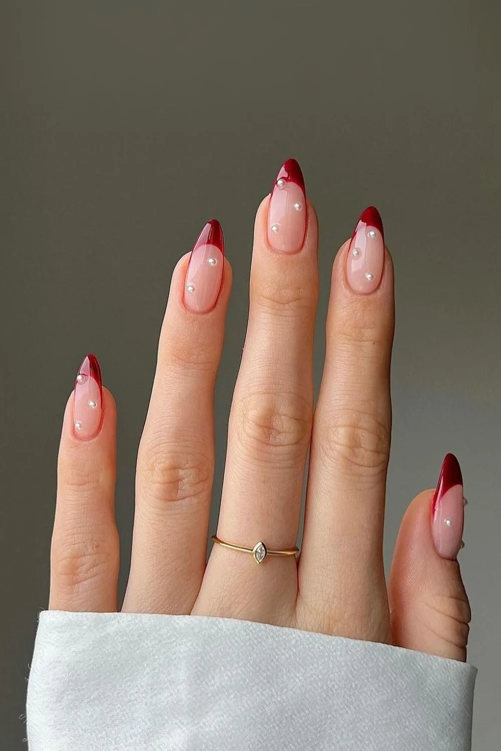 Red French tips with pearls