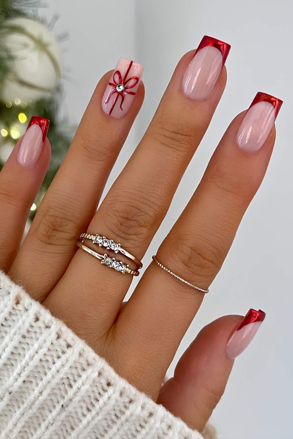 Red chrome French mani with gift bow art