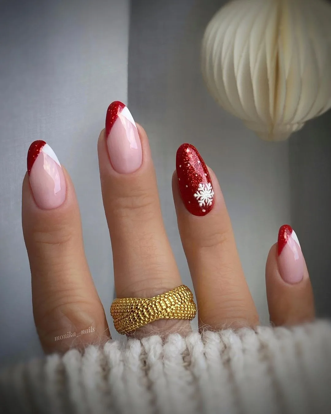 Red glitter french tips with white snowflake accent