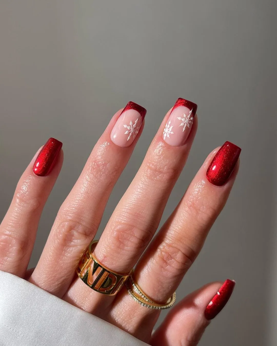 Red velvet nails with white snowflakes