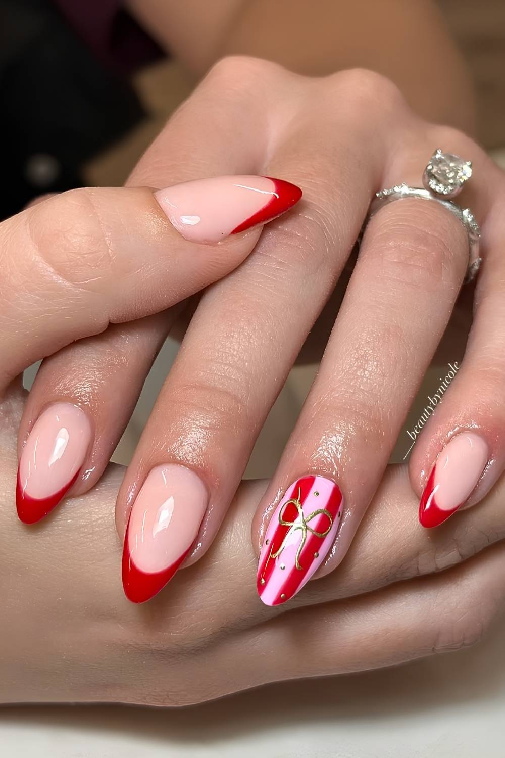 Red winter French mani with pink stripes