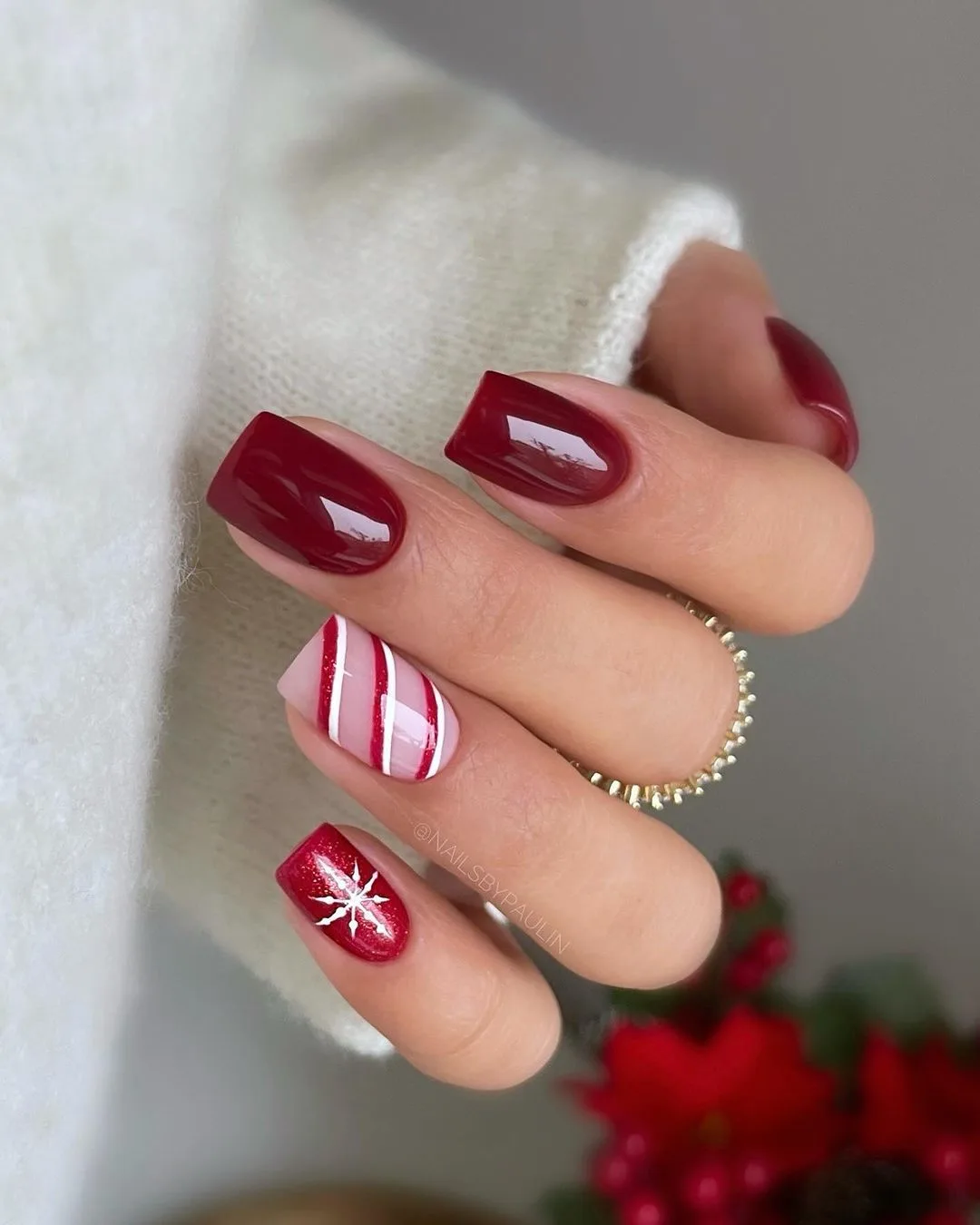 Ruby red nails with christmas motives