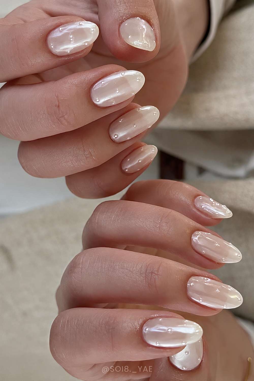 Sheer white chrome nails with micro pearls