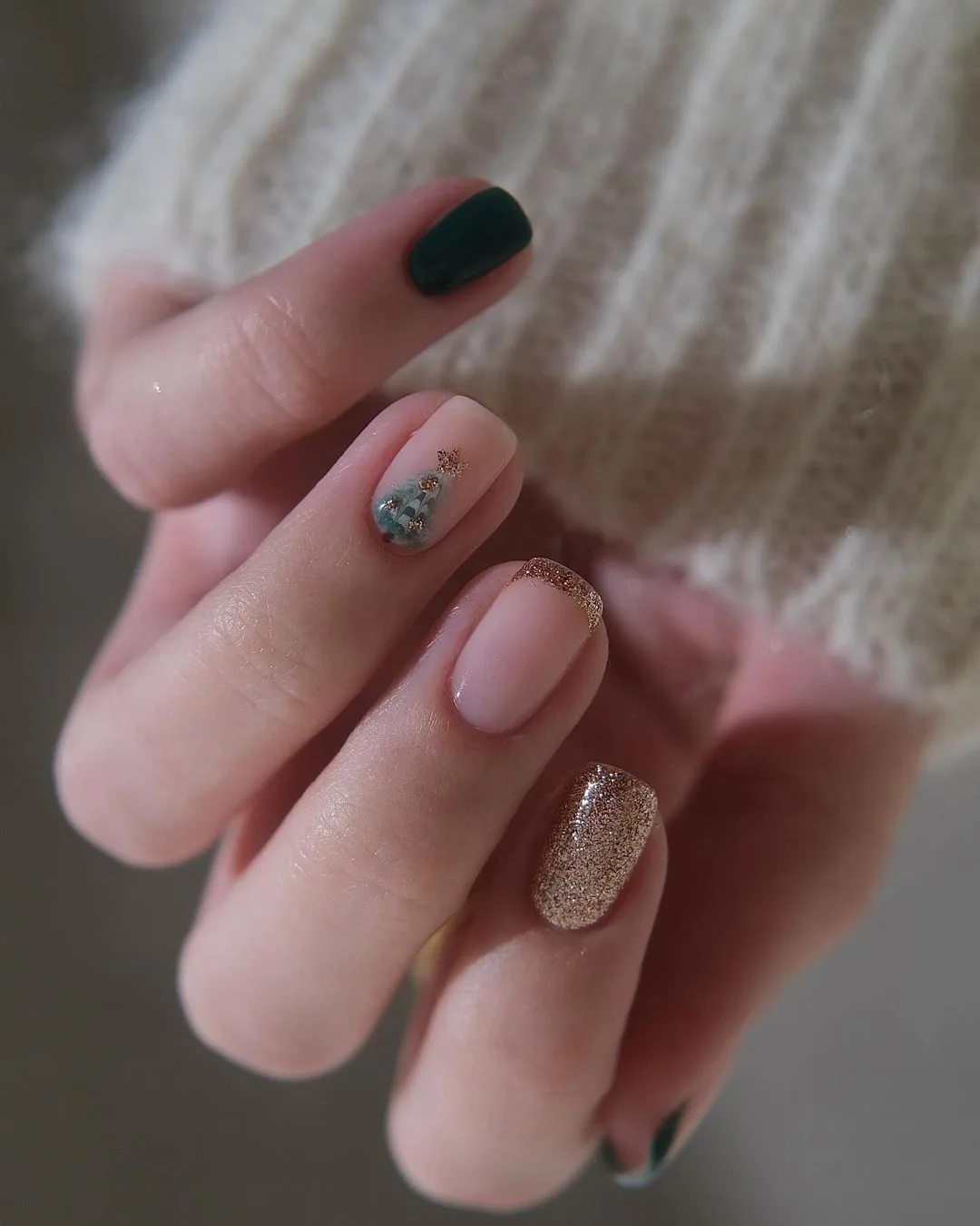 Short Christmas nails with green,gold, and Christmas tree accents