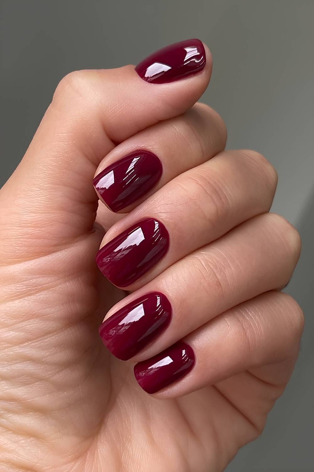 Short deep red nails