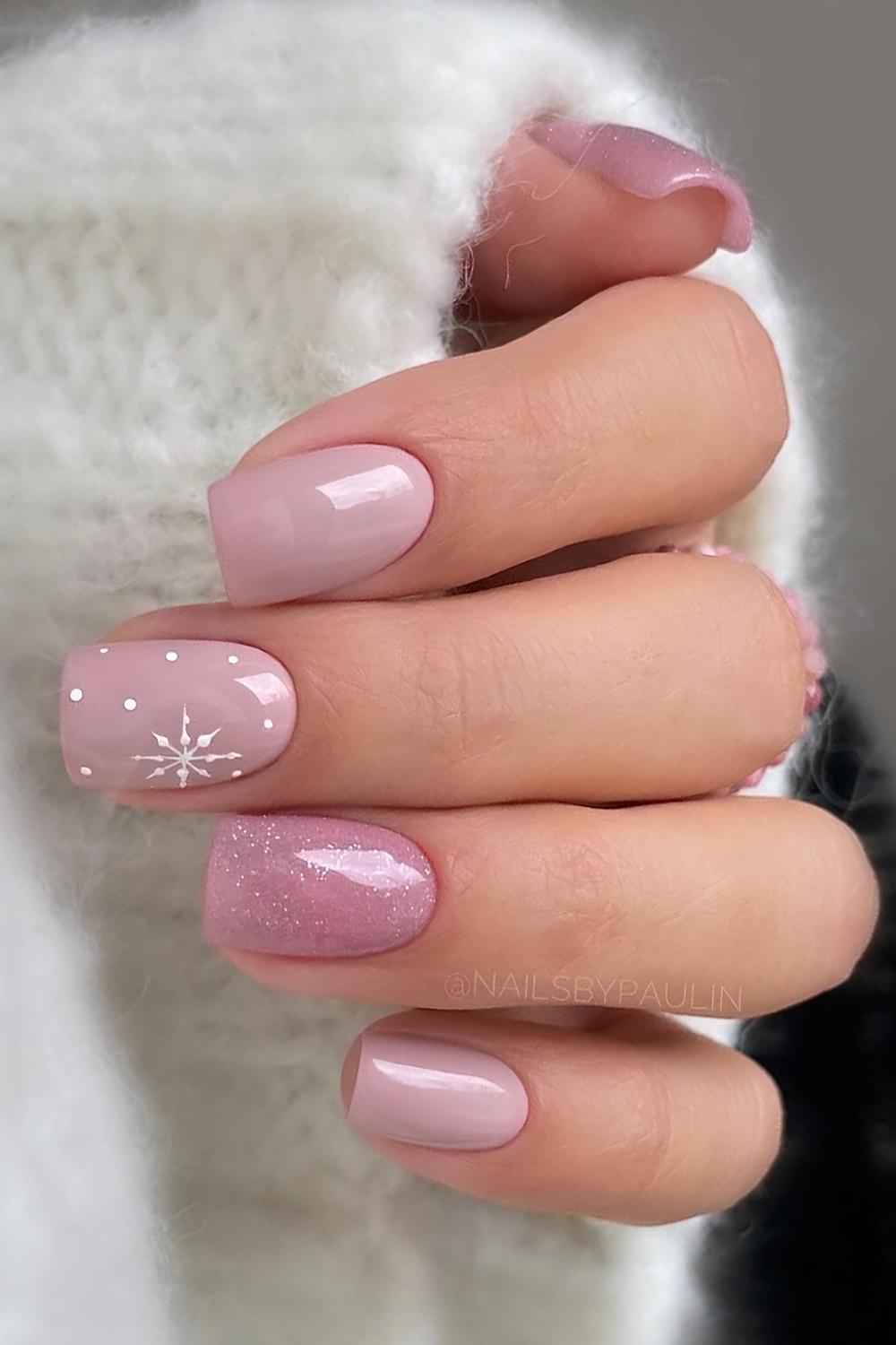Short pink Christmas nails with snowflakes