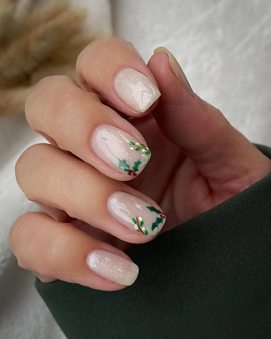 Short shimmery white nails with holly leaves and berries accent nails