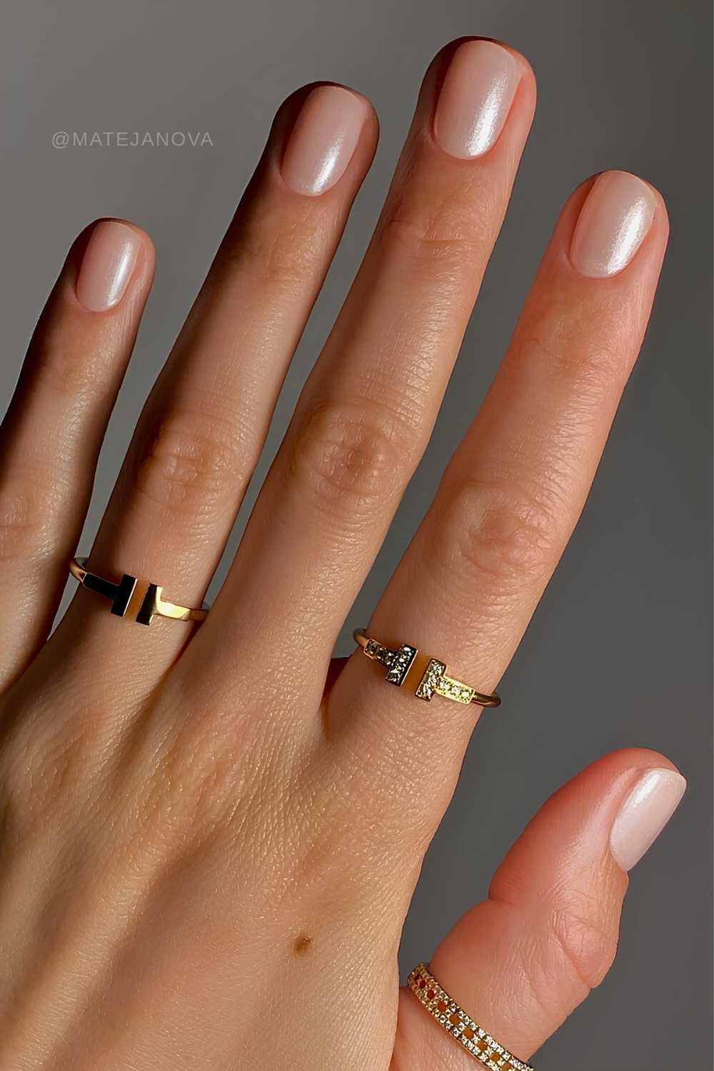 Short white pearlescent nails