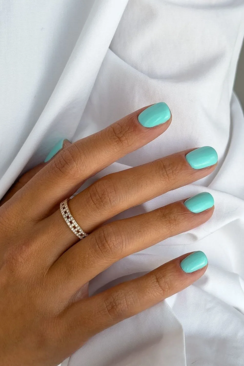 Solid turquoise blue manicure