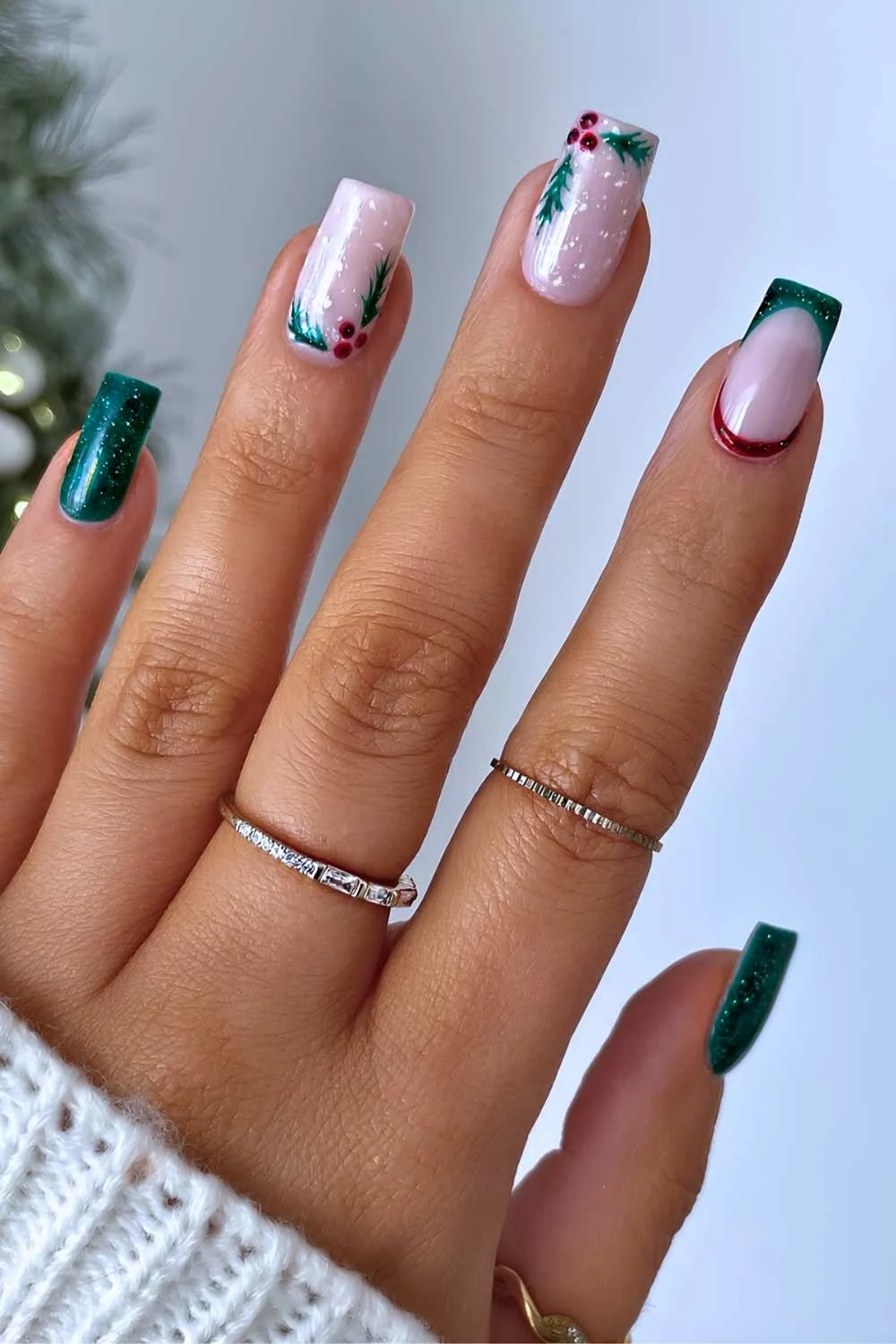 Sparkly green nails with Christmas holly art