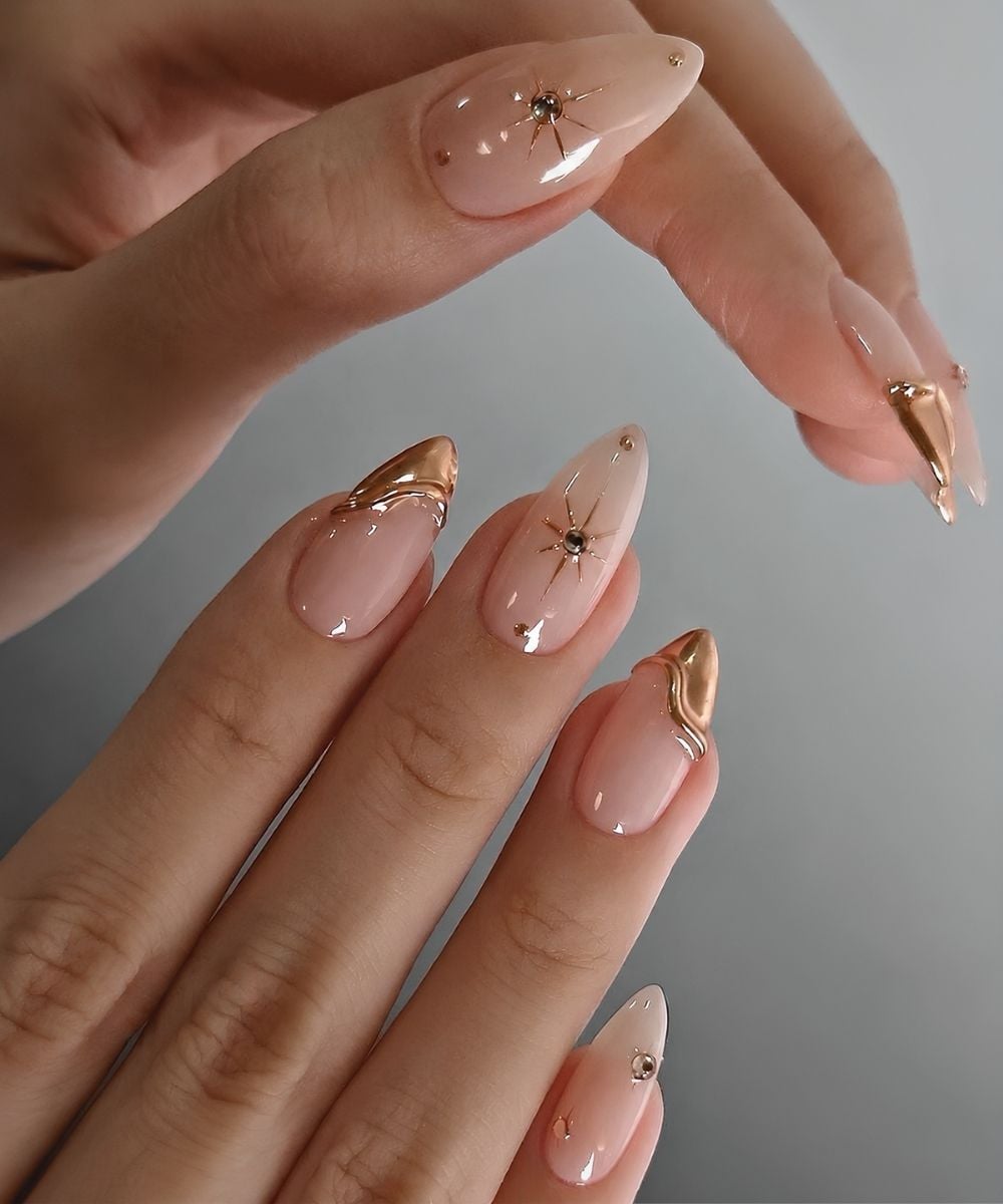 Textured gold French mani with celestial accents