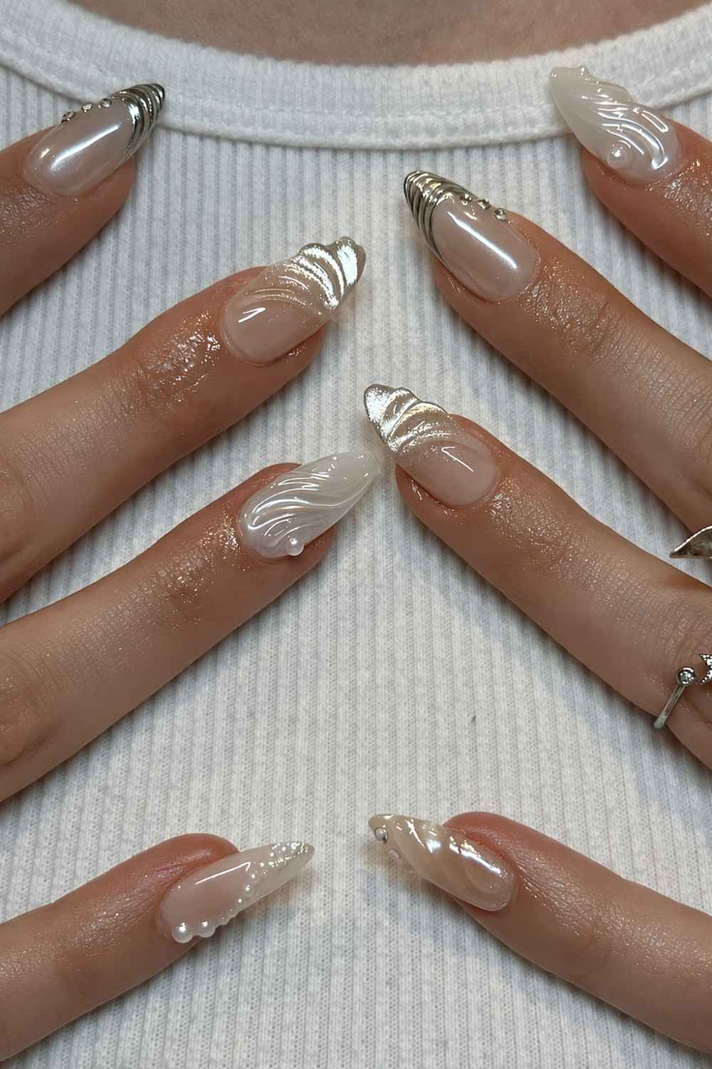 White and silver mani with pearls and 3d swirls