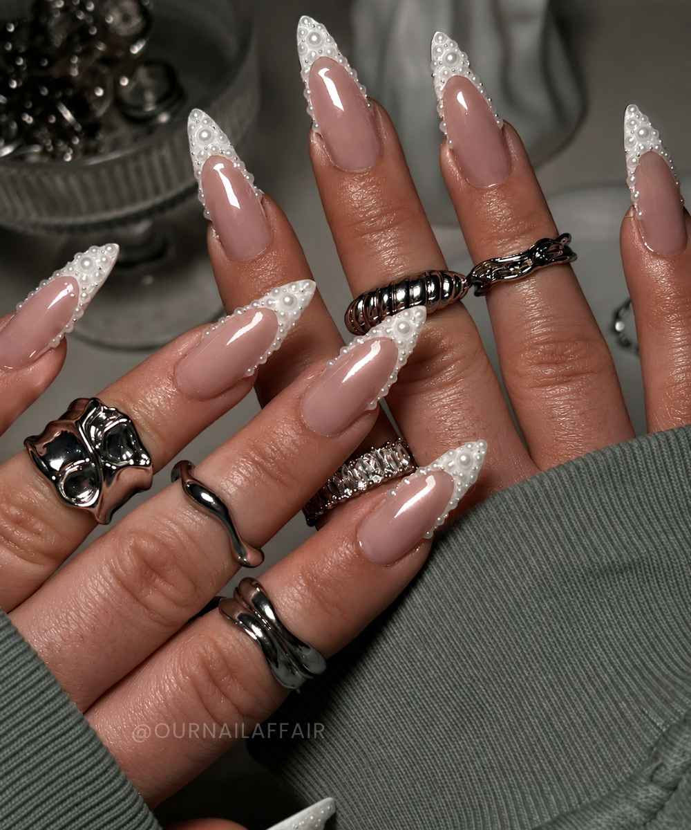 White pearl encrusted French manicure