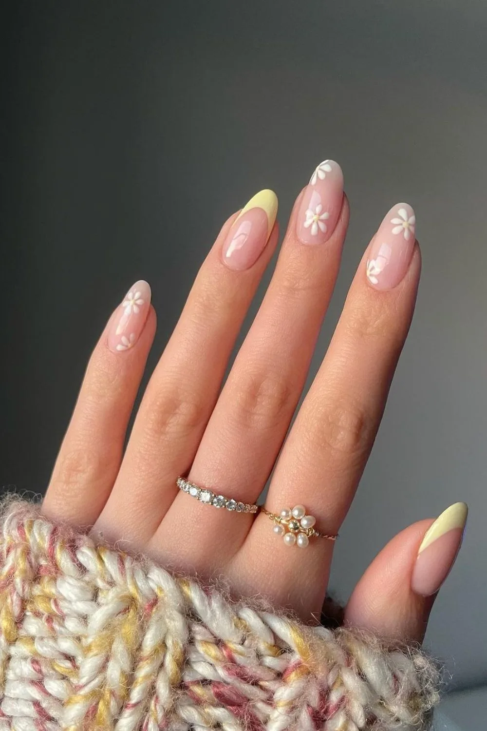 Yellow French nails with daisies