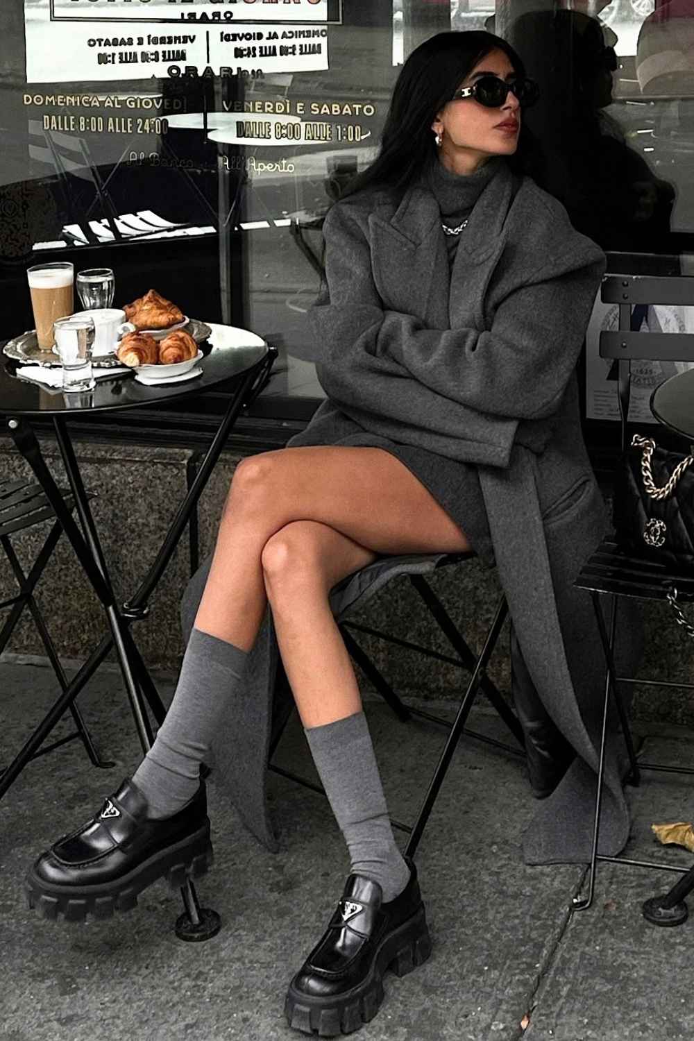 charcoal wrap coat with gray knee socks and platform loafers