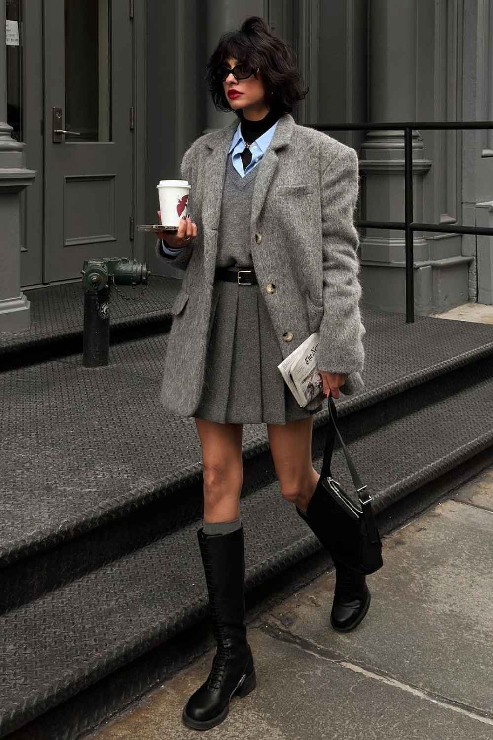 fuzzy gray blazer with pleated mini skirt and knee high boots