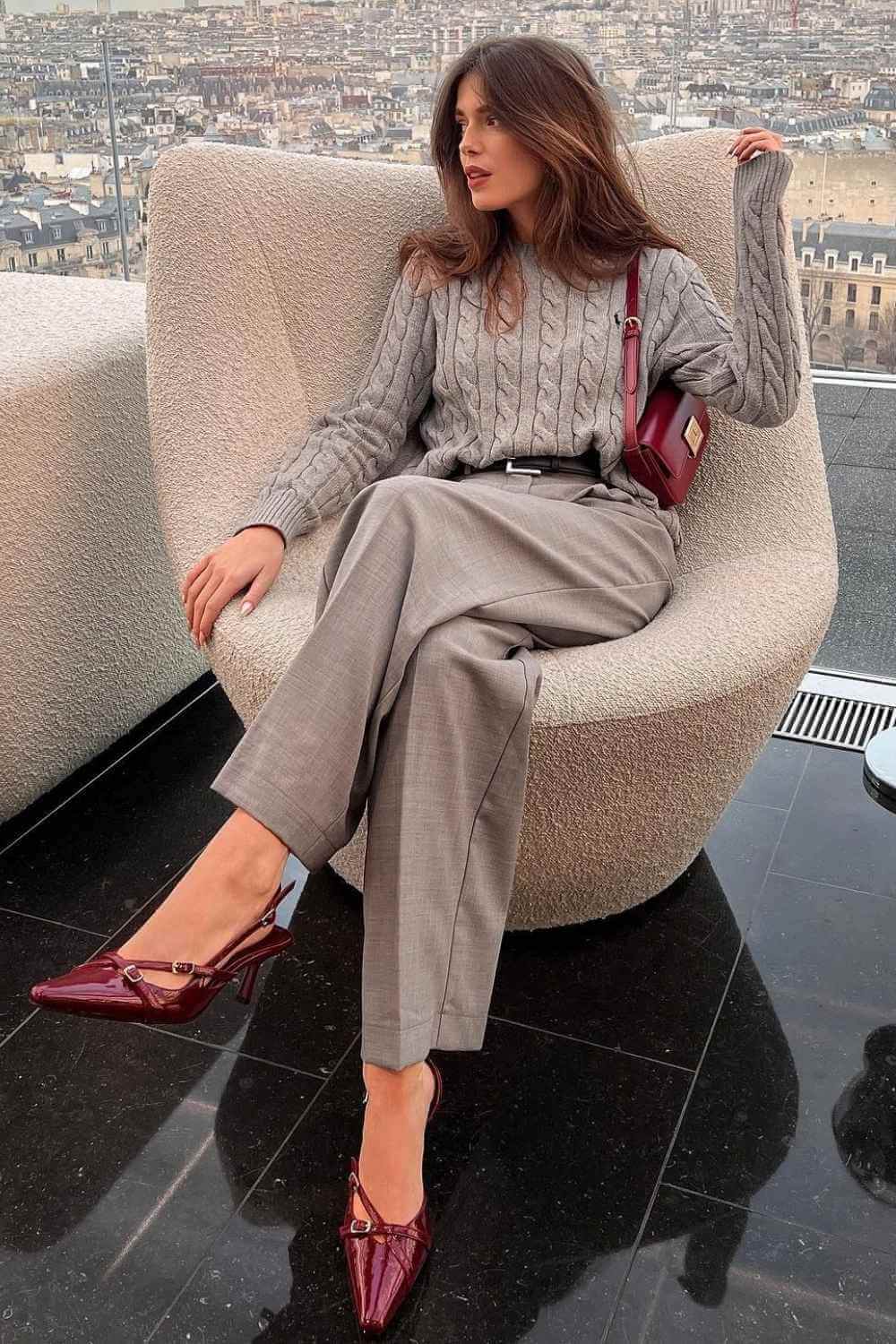 gray cable knit sweater with burgundy slingbacks