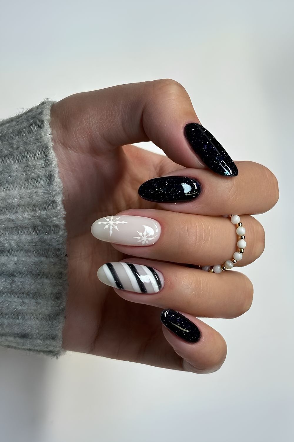 Black & White nails with stripes and glitter