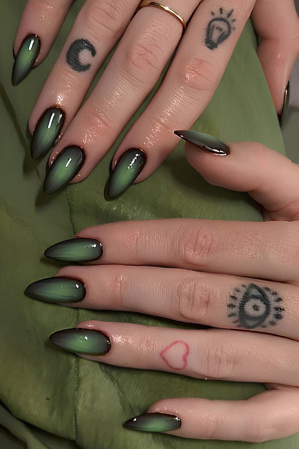 Black and green aura manicure