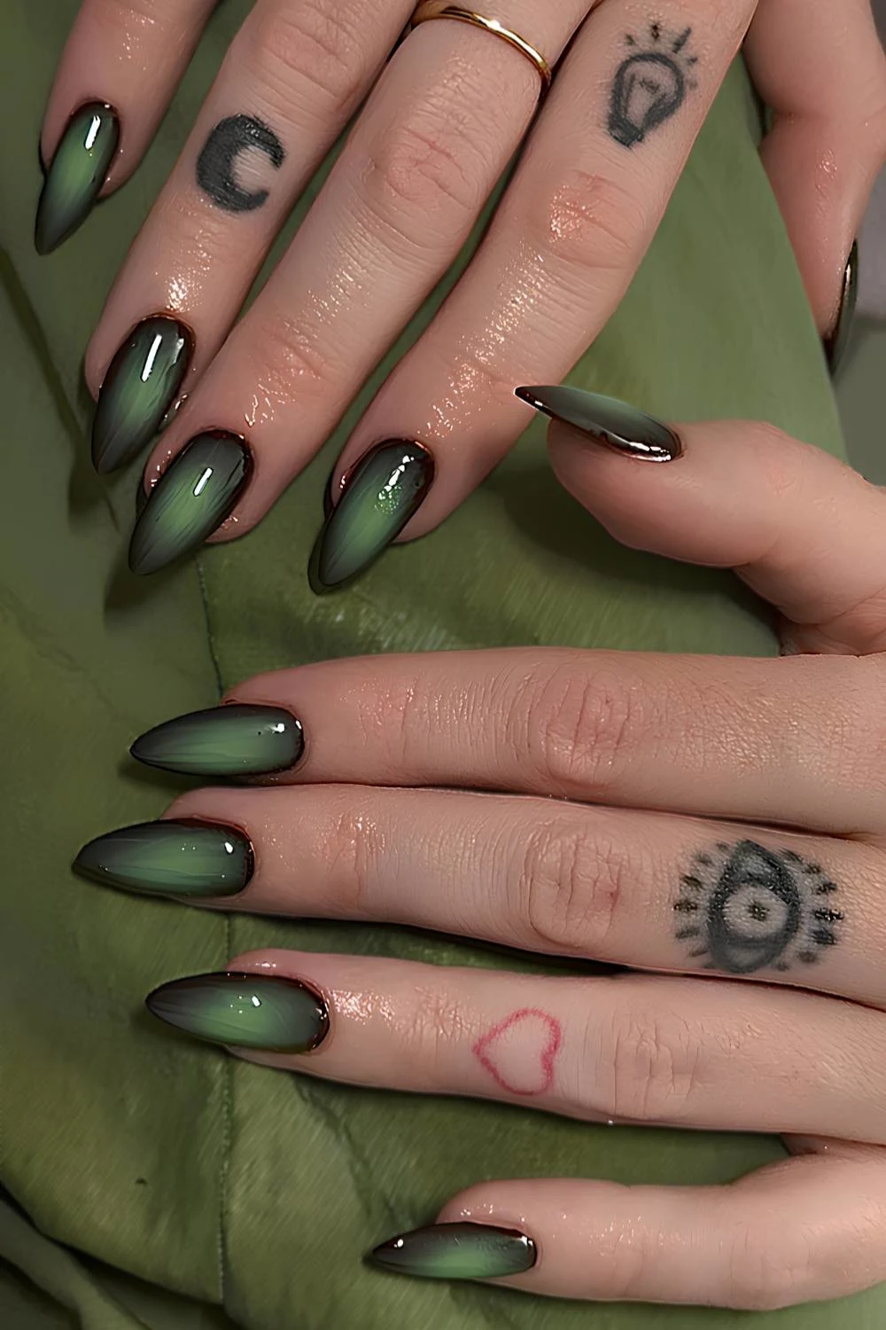 Black and green aura manicure